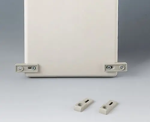 Pattes de fixation pour une installation au mur extérieur